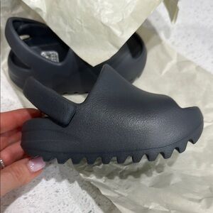 Yeezy Black Slippers with Molded Foam and Ventilation